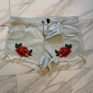 Light washed denim shorts with flowers